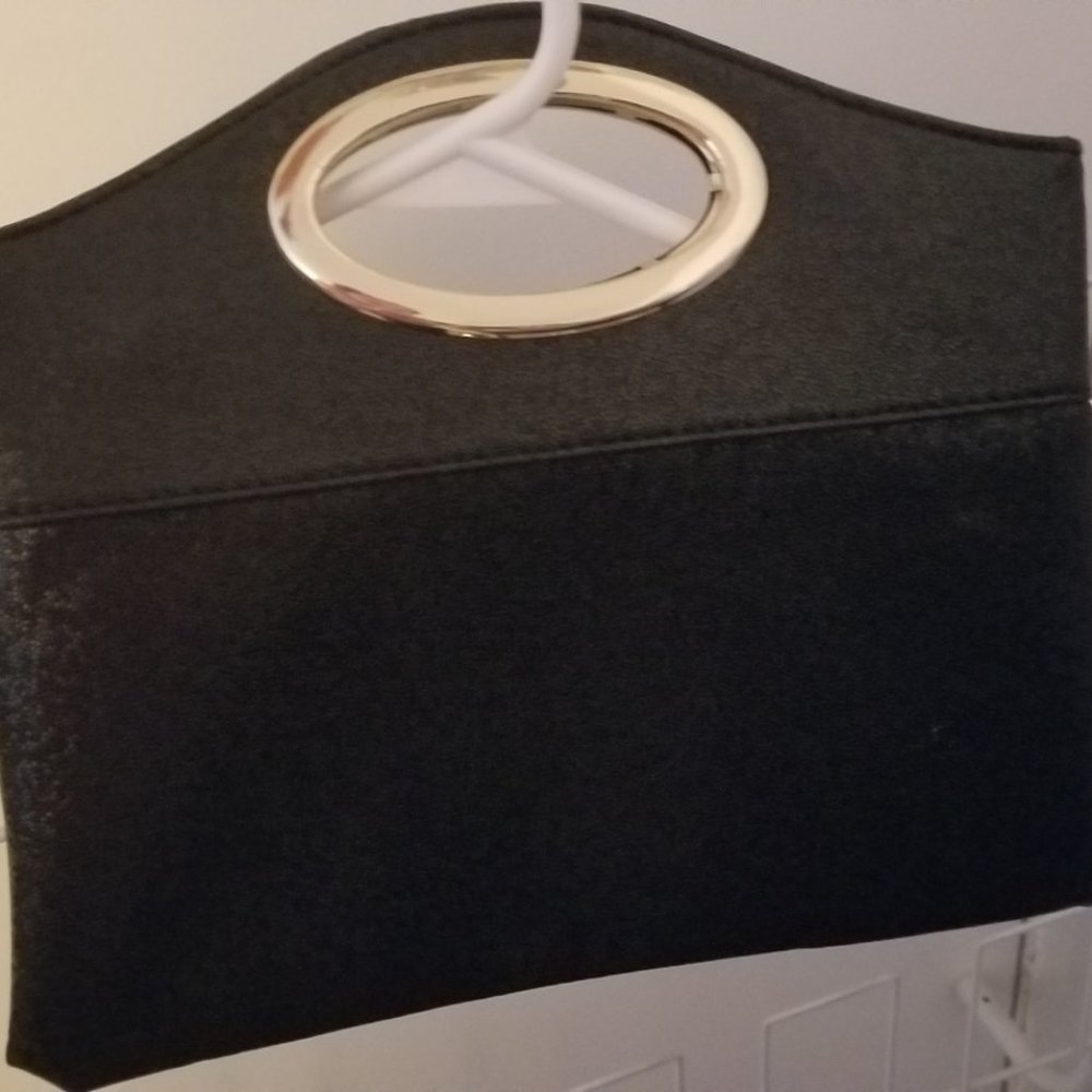 Black and gold clutch bag